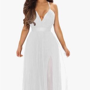 Deep V neckline. Size small. White. New with tags,